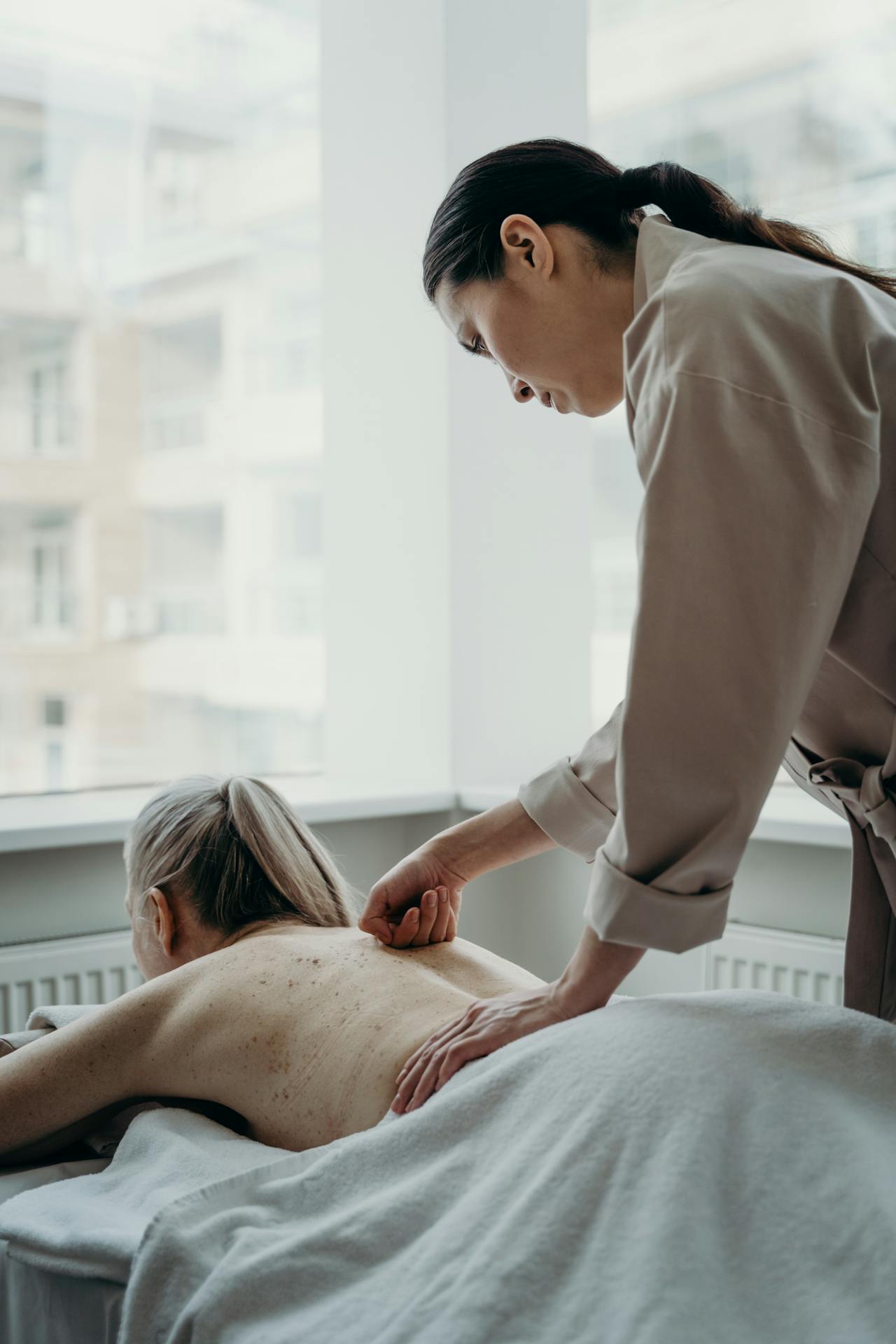Hot Stone Massage Cost 2026: Benefits, Process & Aftercare Guide